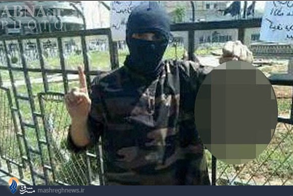 عکس/ سر بریدن یک‌ سوری‌ توسط‌ خواننده‌ انگلیسی‌ عضو داعش