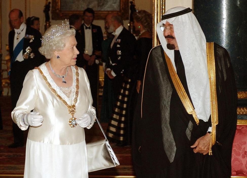 Saudi Arabia's King Abdullah and Britain's Queen Elizabeth arrive for a State Banquet at Buckingham Palace in London