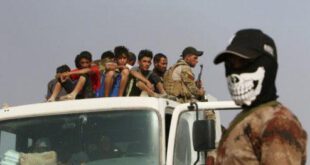 Iraqi displaced from Qayyara sit on a vehicle of Iraqi security forces to transfer to Tikrit, in Qayyara, Iraq, August 29, 2016.  REUTERS/Azad Lashkari