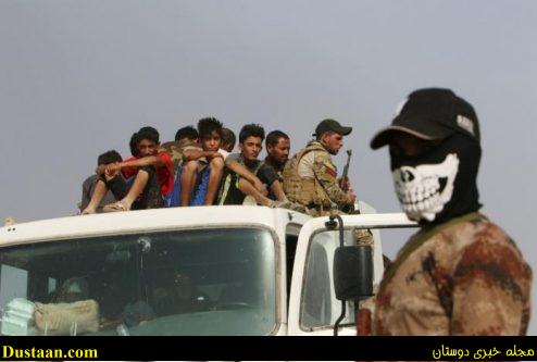 Iraqi displaced from Qayyara sit on a vehicle of Iraqi security forces to transfer to Tikrit, in Qayyara, Iraq, August 29, 2016. REUTERS/Azad Lashkari