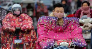 لباس موتورسواری چینی‌ها در روزهای سرد!