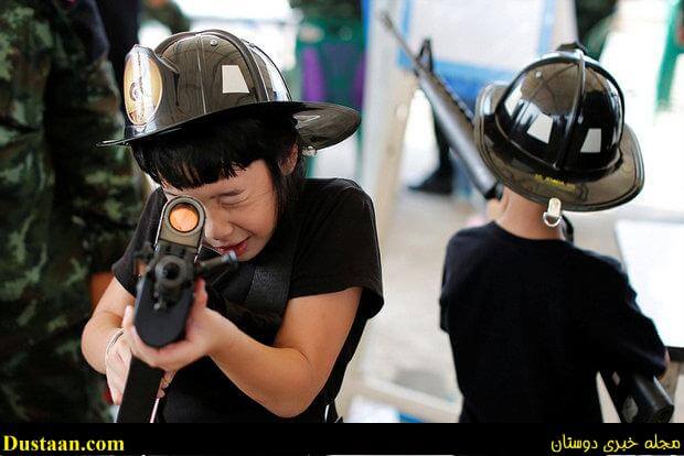 www.dustaan.com-تصاویر: تفنگ های جنگی در اختیار کودکان تایلندی