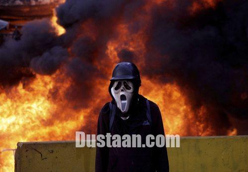 ماسک عجیب یک تظاهرات کننده درونزوئلا/عکس
