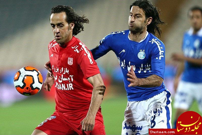 https://upload.wikimedia.org/wikipedia/commons/d/df/Ali_Karimi_trying_to_past_Pejman_Nouri.jpg