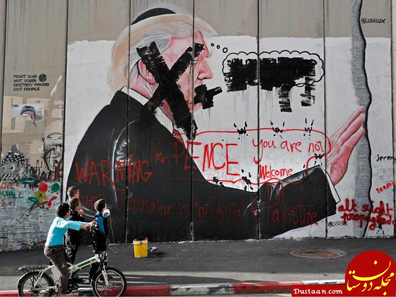 www.dustaan.com-خط‌خطی کردن چهره ترامپ بر دیوار حائل بیت‌المقدس و بیت‌اللحم + تصاویر