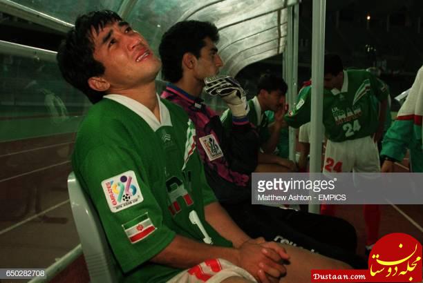 https://media.gettyimages.com/photos/irans-khodadad-azizi-crys-in-the-dug-out-after-his-country-lost-on-picture-id650282708?s=612x612